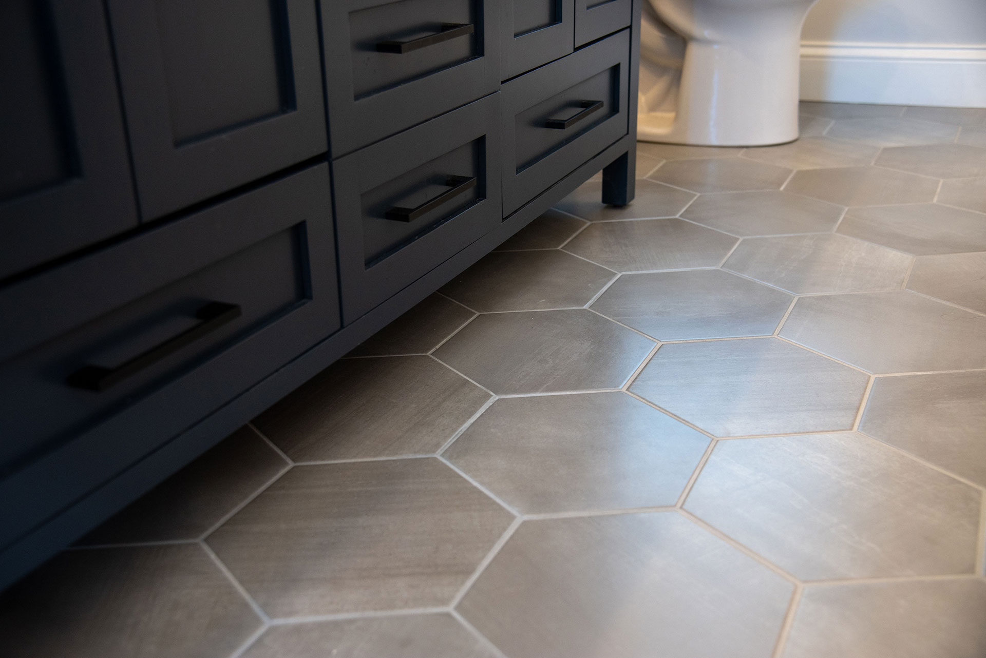bathroom floor with hexagon ceramic tile